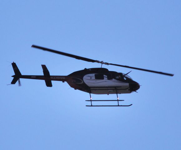 — — - GREG BIFFLE INC - Buzzing over Huntersville, NC - 3/8/10