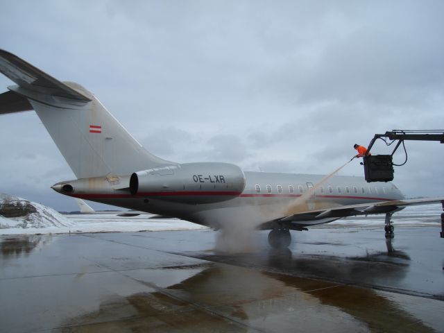 Bombardier Global Express (OE-LXR) - Bombardier Global Express getting a Type I Deice bath March 12, 2008 at the Fort McMurray Airport.