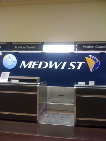 — — - The Midwest Airlines ticket counter after the merger with Frontier.
