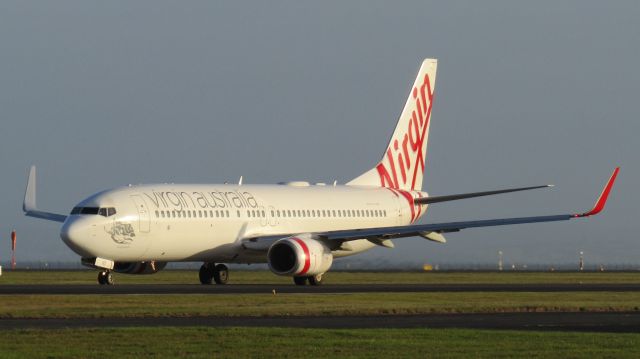 Boeing 737-800 (VH-YIG) - Late evening departure.