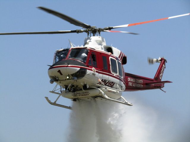 Bell 412 (N141FA) - Orange County Fire Authority Bell 412 chopper demonstrating a water drop during Fullerton Airport Day 5.14.2017.