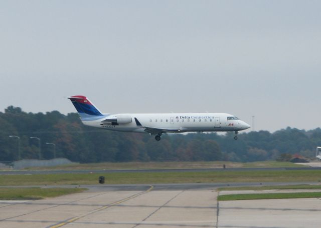 Canadair Regional Jet CRJ-200 (N932EV) - Landing at the Shreveport Regional airport.