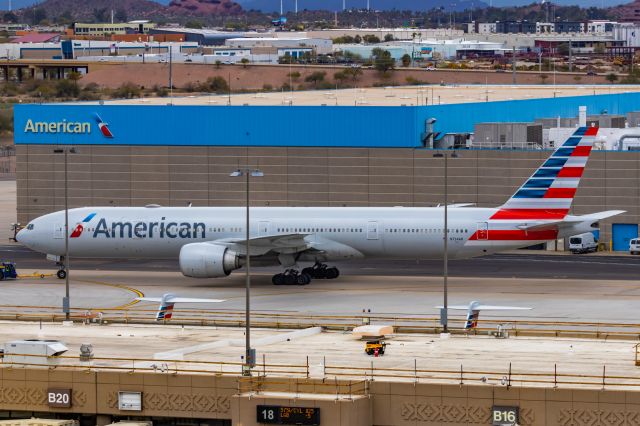 BOEING 777-300ER (N734AR) - An American Airlines 777-300ER taxiing at PHX on 2/14/23. Taken with a Canon R7 and Canon EF 100-400 II L lens.