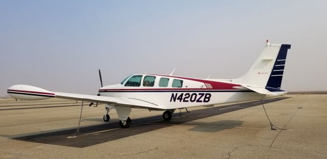 Beechcraft Bonanza (36) (N420ZB) - 4 Aug 18 Fox field, smoke from fires reduced visibility 8-10. If you lack photography basics, dont vote.