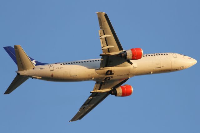 Boeing 737-700 (LN-BRI) - Rare sighting of a B737-400, belonging to SAS, seen here departing runway 027R at LHR.