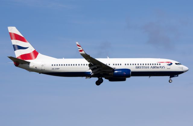 Boeing 737-800 (ZS-ZWP) - Directly behind the Safair B734 was this British Airways Comair B737-86N Next Gen ZS-ZWP, operating flight CAW6241 from JNB (FAOR) to PLZ (FAPE) on short finals to runway 26. This pic was snapped at 12:50pm on Wednesday 5 September, half an hour before the weather turned for the worse and I had to high-tail it out of there.