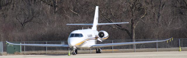 Cessna Citation Sovereign (N55G) - Took this photo of N55G while standing on top of the bleachers at KPWK observation lot.