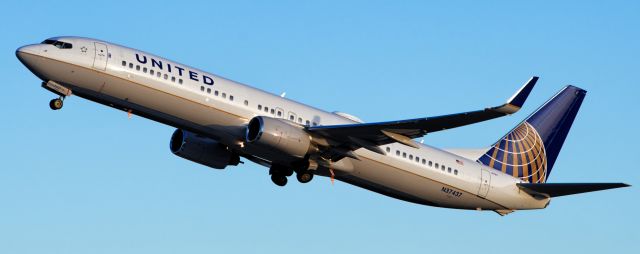 Boeing 737-800 (N37437) - Taken from the west side of runway 35R in Calgary Alberta late afternoon/ early evening. 