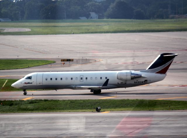 Canadair Regional Jet CRJ-200 (N418SW) - Landing on 30R at MSP on 07/31/2011