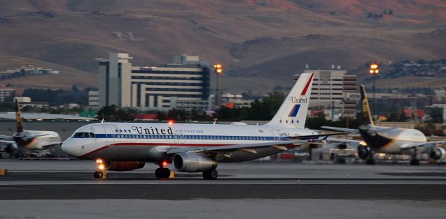 Airbus A320 (N475UA) - Captured here exactly six hours ago, this snap shows UAs N475UA, the retro painted A320, as it accelerates down runway 16R during its 6:00 AM departure enroute to KDEN.  