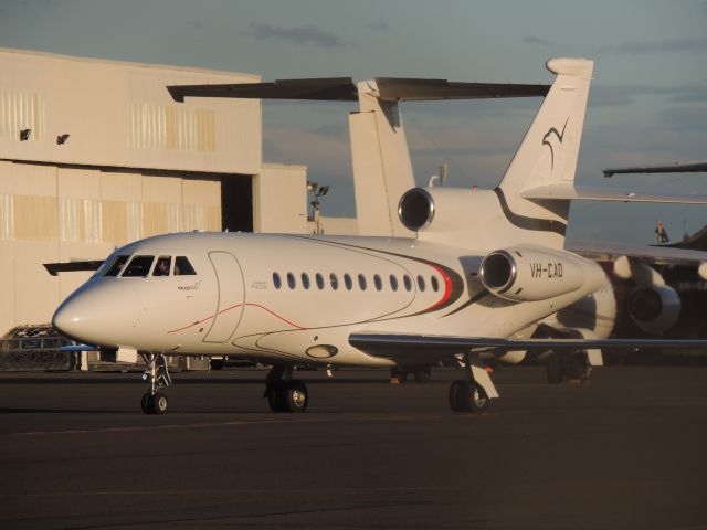 Dassault Falcon 900 (VH-CAD) - This photo was taken at Bankstown airport with a coolpix-P510. This Dassault Mystere was actually coming from Taree, YTRE to it's home, Bankstown, YSBK to the Navair hangar. 