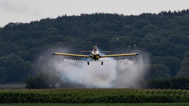 N9197V — - A crop duster spraying a field in Ashland, NE with a little bit of smoke action on top of all that pesticide!