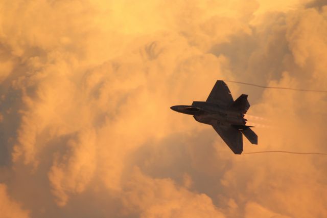 Lockheed F-22 Raptor — - With a towering cumulonimbus anvil as the Saturday Airventure 2019 backdrop.  br /br /F-22 Evening Demo from Langley AFB