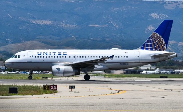 Airbus A319 (N835UA) - United A319 beginning the departure roll for its flight back to Denver.