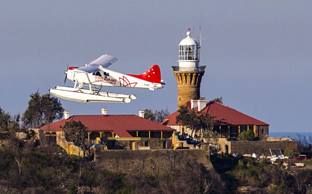 De Havilland Canada DHC-2 Mk1 Beaver (VH-NOO) - Taken from west head NSW Australia. The plane is in front of the Palm Beach Lighthouse.