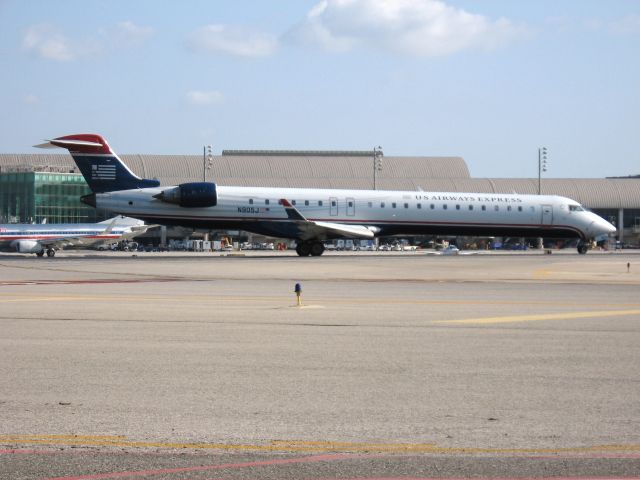 Canadair Regional Jet CRJ-900 (N905J) - Holding on RWY 19R