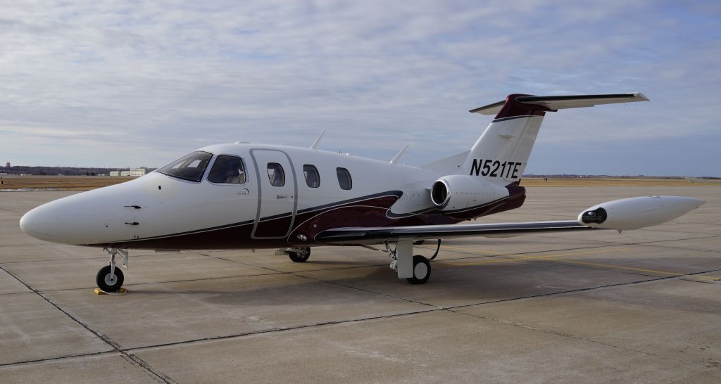 Eclipse 500 (N521TE) - Eclipse 500 (Total Eclipse) N521TE after a new paint job from HillAero Mods located at Lincoln Airport, NE.