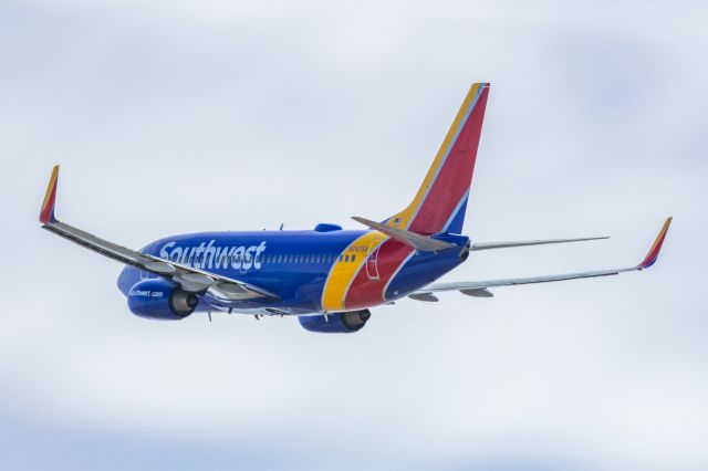 Boeing 737-700 (N747SA) - A Southwest 737-700 taking off from PHX on 2/11/23 during the Super Bowl rush. Taken with a Canon R7 and Canon EF 100-400 II L lens.