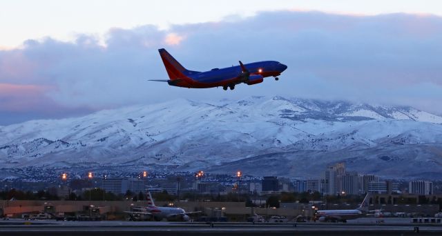 Boeing 737-700 — - A Southwest B737 makes a morning departure from 34L.