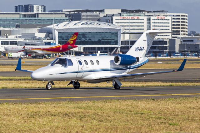 Cessna Citation CJ1 (VH-DAA) - Vanguard Aviation (VH-DAA) Cessna 525 Citation CJ1 taxiing at Sydney Airport, fitted with tamarack winglets.