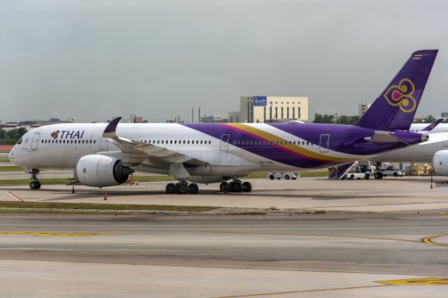 Airbus A350-900 (HS-THG) - 5th June., 2022: Parked on the apron at Bangkok's Suvarnabhumi International Airport prior to departure for Hong Kong as flight TG 368.