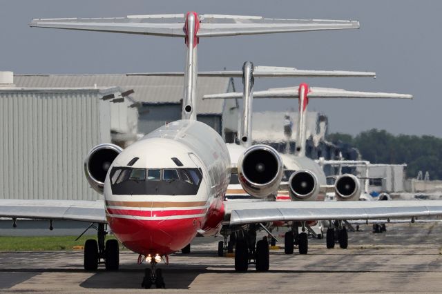 McDonnell Douglas MD-80 (XA-UXI) - A trio of vintage Aeronaves TSM McDonnel Douglas freighters lined up on the ramp at KTOL this afternoon, 1 Jul 2021. Seen from front to back are XA-UXI, an MD-82(SF), XA-UZJ, a DC-9-33F, and XA-TIG, a DC-9-15 (F). 