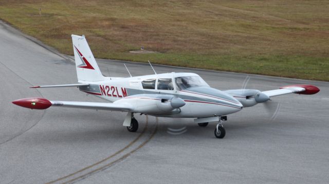 Piper PA-30 Twin Comanche (N22LM) - Captivated by the beauty of the Saab 2000 that'd just landed, I almost missed this vintage beauty! This Twin Comanche had just landed from KLGC, a route that it flies quite frequently.