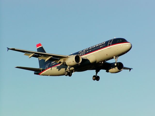 — — - Late afternoon arrival at KCLT