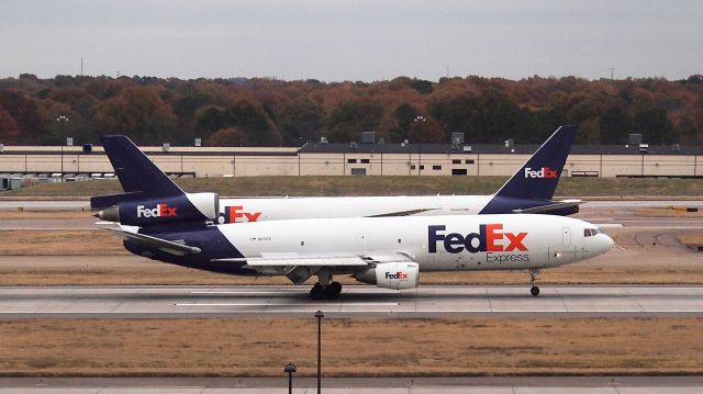 McDonnell Douglas DC-10 (N571FE) - "Ella" arrives on 18C (w/ N884FD "Ananyaa" behind).