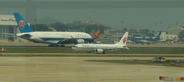 Airbus A380-800 (B-5137) - 6/23/18 rolling down Rwy 36R as Air China B738 B-1223 taxis out