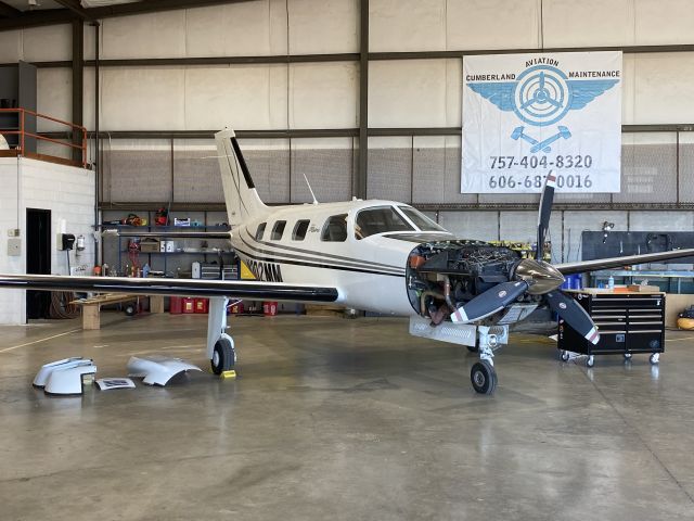 Piper Malibu Mirage (N302MM) - Date Taken: October 12, 2024br /br /Resting in the hangar while waiting for an engine replacement!