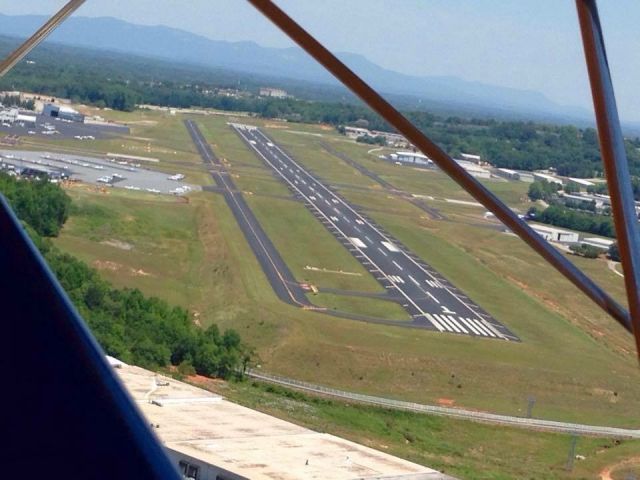 N4408N — - Open canopy biplane on approach at downtown Greenville!