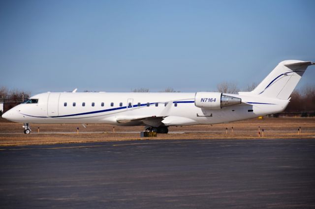 Canadair Regional Jet CRJ-100 (N7164) - Bombardier CRJ-100ER opby Elite Airways (Regional One) departing the FBO ramp at the Buffalo Niagara International Airport for Melbourne, Florida (KMLB) as MNU7164br /br /** First Photos of N7164 on FlightAware **