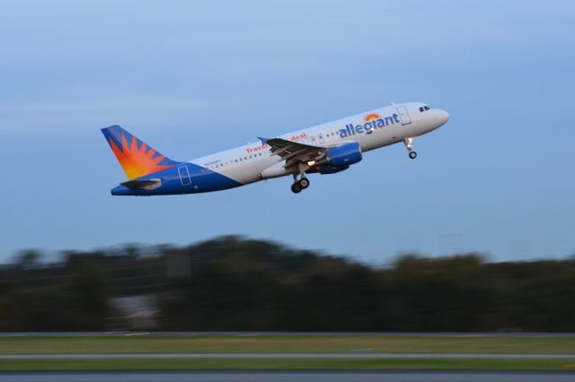 Airbus A320 (N226NV) - Departing KJQF at dusk - 10/23/18