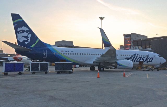 Boeing 737-800 (N562AS) - Fresh new colors awaiting departure @ KBOS Logan