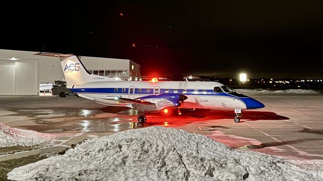 Embraer EMB-120 Brasilia (N127CZ) - All lit up and ready to go, N127CZ just after starting up. Operating as FRG428 and carrying Drake University Men’s Basketball team back home after a game against Valpo University earlier today. 2/23/22. 