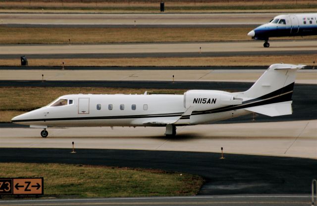 Learjet 60 (N115AN) - Taxiing at Washington-Dulles