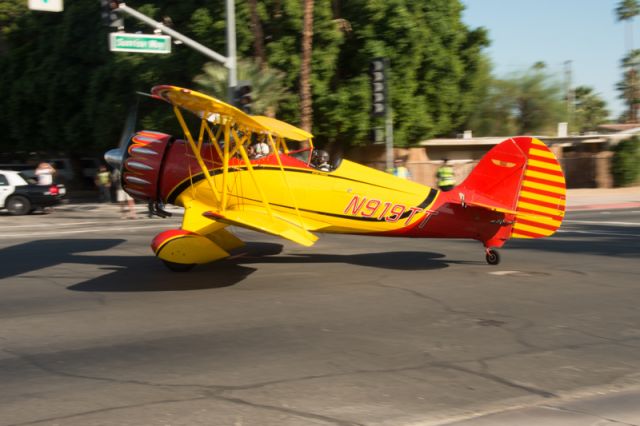 WACO O (N919TT) - Turning on to Sunrise Way, Palm Springs. This was the return of the Parade of Planes to mark the end of the AOPA 2012 Summit.