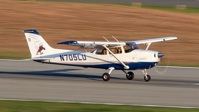 Cessna Skyhawk (N705LU) - A Liberty University C172 departing Lynchburg at golden hour.