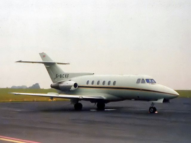 Hawker Siddeley HS-125-400 (G-BCXF) - HS125-600B at NCL photo circa mid 1975 then owned by McAlpine Aviation. Aircraft had several owners after McAlpine Aviation sold it. Allegedly under another owner with registration 5N-RNO it was "written off" 08 Jul 98 at LOS when the aircraft ran out of fuel just short of LOS runway on its approach. Thankfully (it is reported) all on board survived.