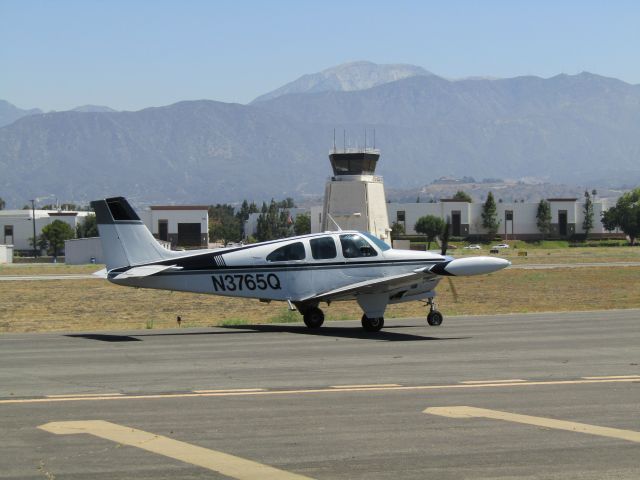 Beechcraft Bonanza (33) (N3765Q) - Taxiing to RWY 26L