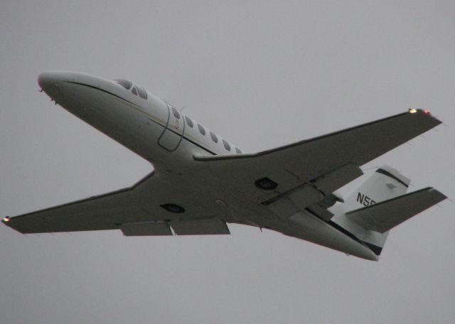 Cessna Citation CJ1 (N550CZ) - Taking off from runway 32 at the Shreveport Downtown airport on a cold, overcast day.