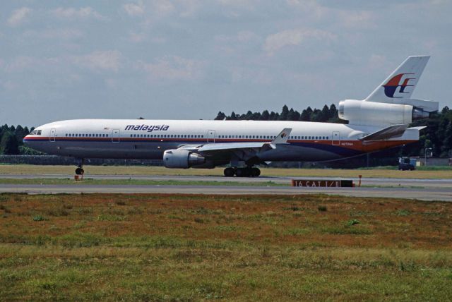 Boeing MD-11 (N73WA) - Departure at Narita Intl Airport Rwy16R on 1995/09/09