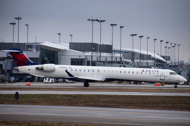 Canadair Regional Jet CRJ-900 (N138EV) - Endeavor Air (d.b.a. Delta Connection) CRJ-900LR leaving Buffalo for LaGuardia ...