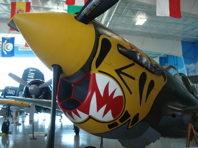 CURTISS Warhawk (N401WH) - P-40 in the front - Samurai Zero and a Corsiar in the back - Fargo Air Museum