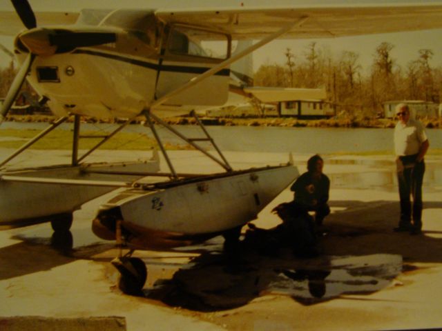 Cessna Skywagon (N34Q) - 34Q in front of maintenance hangar at Westwego Aviation. The grey headed guy is Mr. Bert Gurtner.