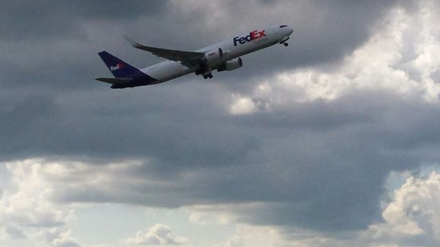 N107FE — - Watching FDX aircraft taking off south of RWY 5R at KIND