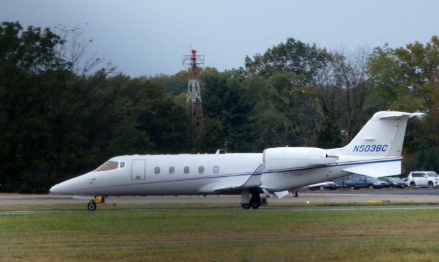 Learjet 60 (N503BC) - Taxiing to the terminal is this 2001 Learjet 60 in the Autumn of 2019.