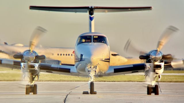 Beechcraft Super King Air 350 (N701FC) - Fargo Jet Center’s B350 getting ready to head back home after the ISU v. NDSU game.br /br /(ft. NDSU’s charter on takeoff roll in the background)br /br /This aircraft is a 2000 Beechcraft 300 Super King Air 350, SN FL-291, owned/operated by Fargo Jet Center. 10/8/22. 