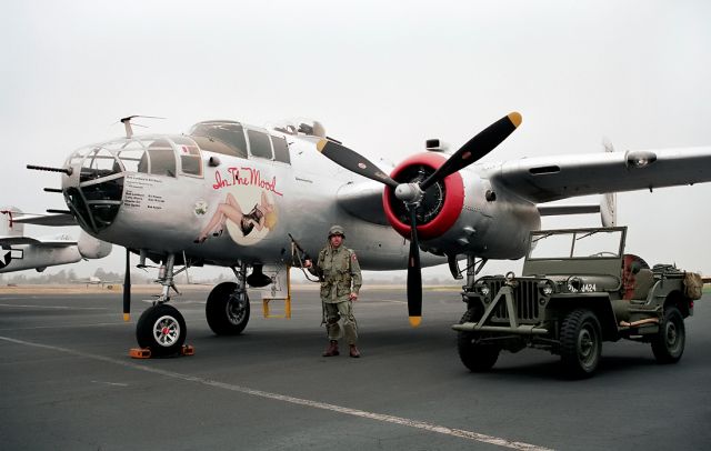 N9117Z — - The B-25J In the Mood and a reenactor and his ride @ Sonoma County airport, Santa Rosa, CA.